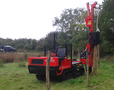 tracked post knocker